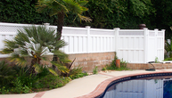 Vinyl Privacy Fencing on Block Wall with Pool Enclosure